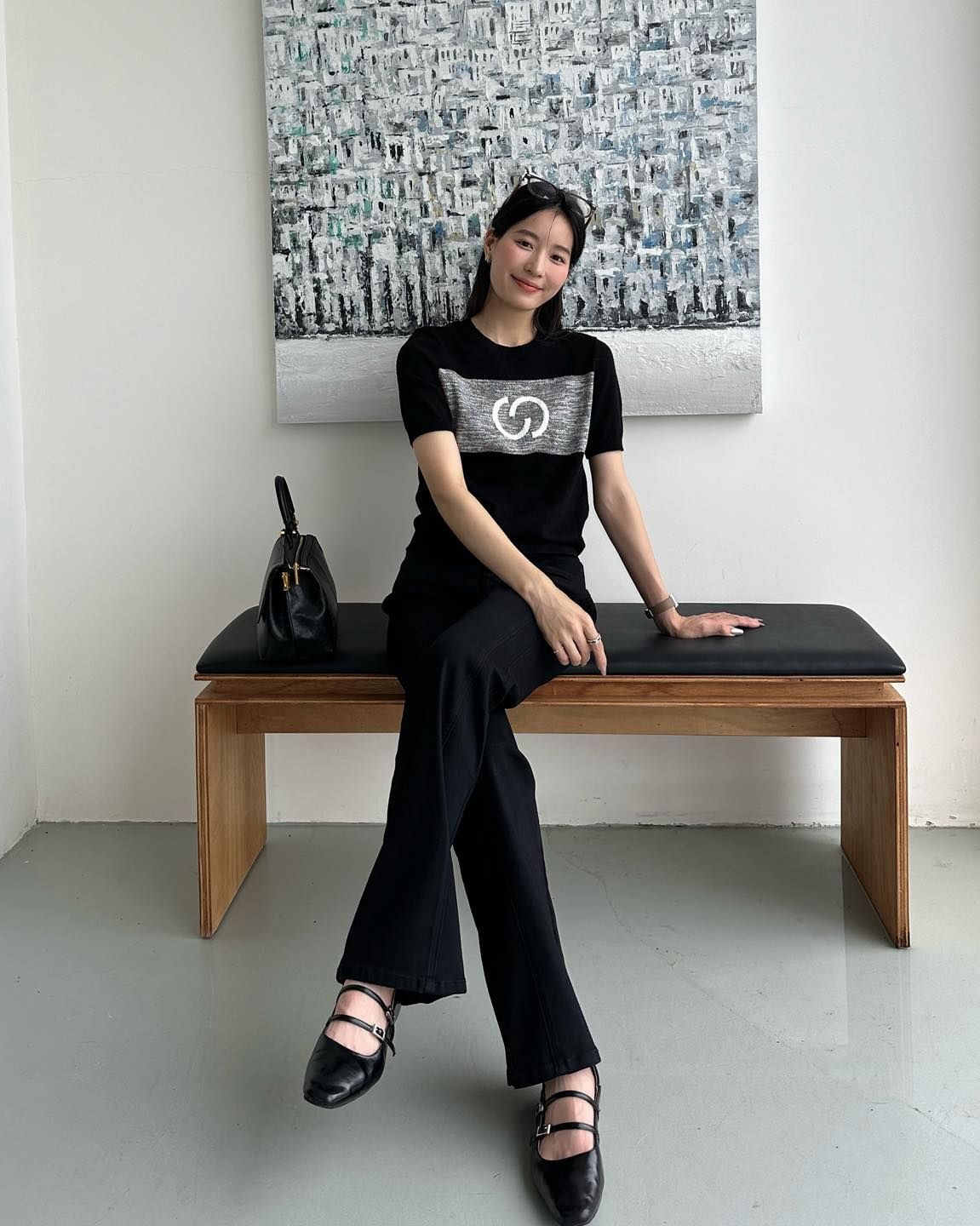  Quần jean đen ôm ống hơi vẩy 