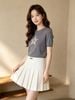  Chân váy ngắn trắng cạp chữ đen 