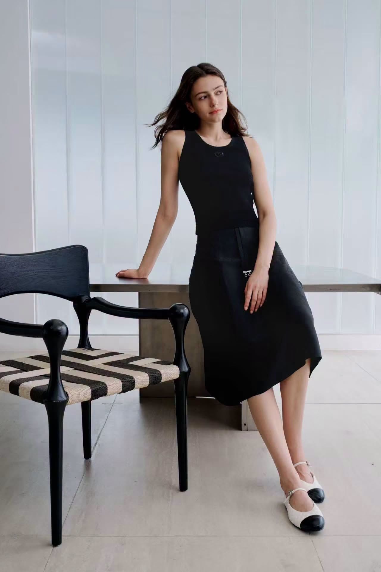  Áo tanktop đen vân nổi - logo xequin 