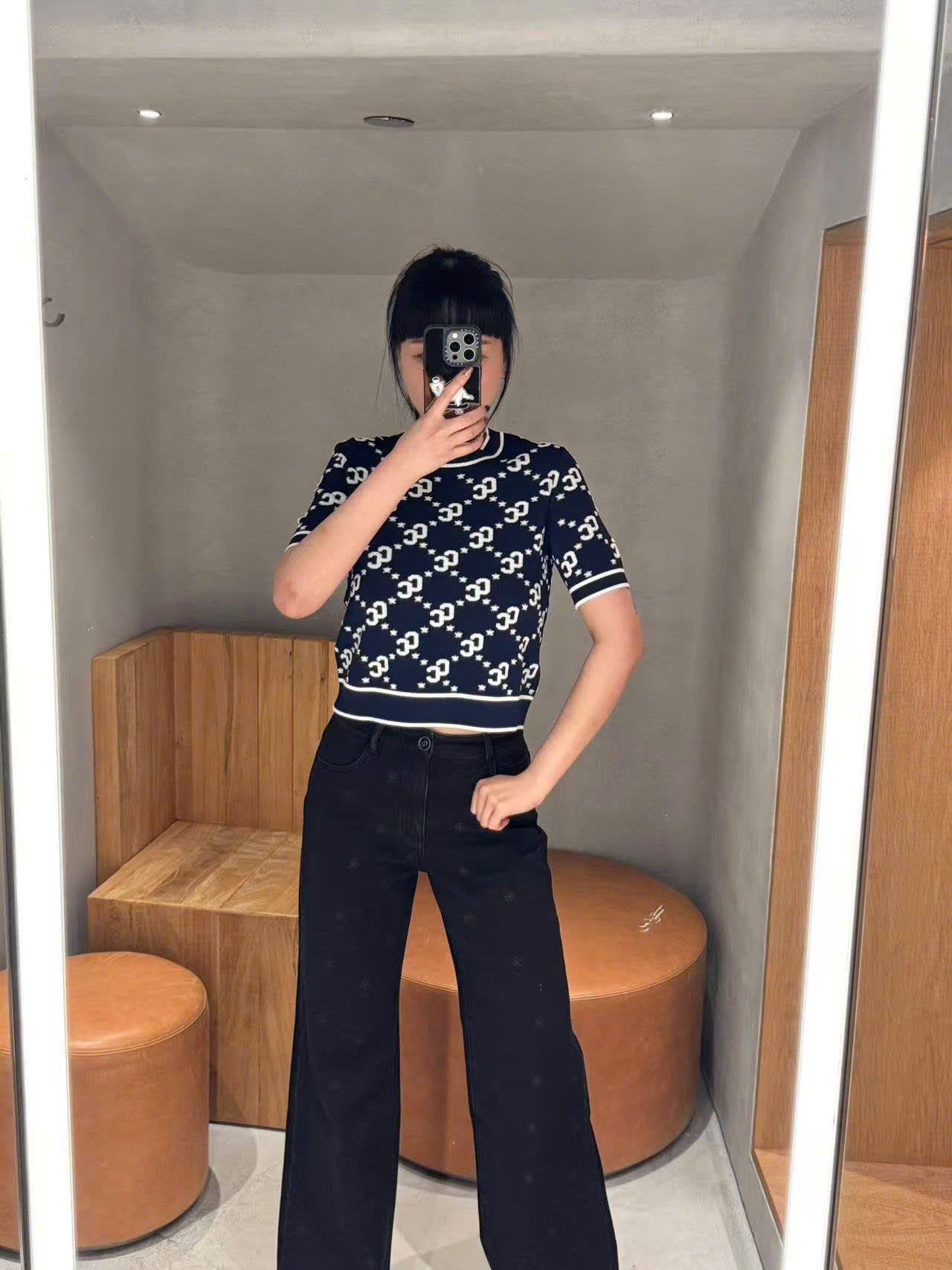  Quần jean đen hoa trà 