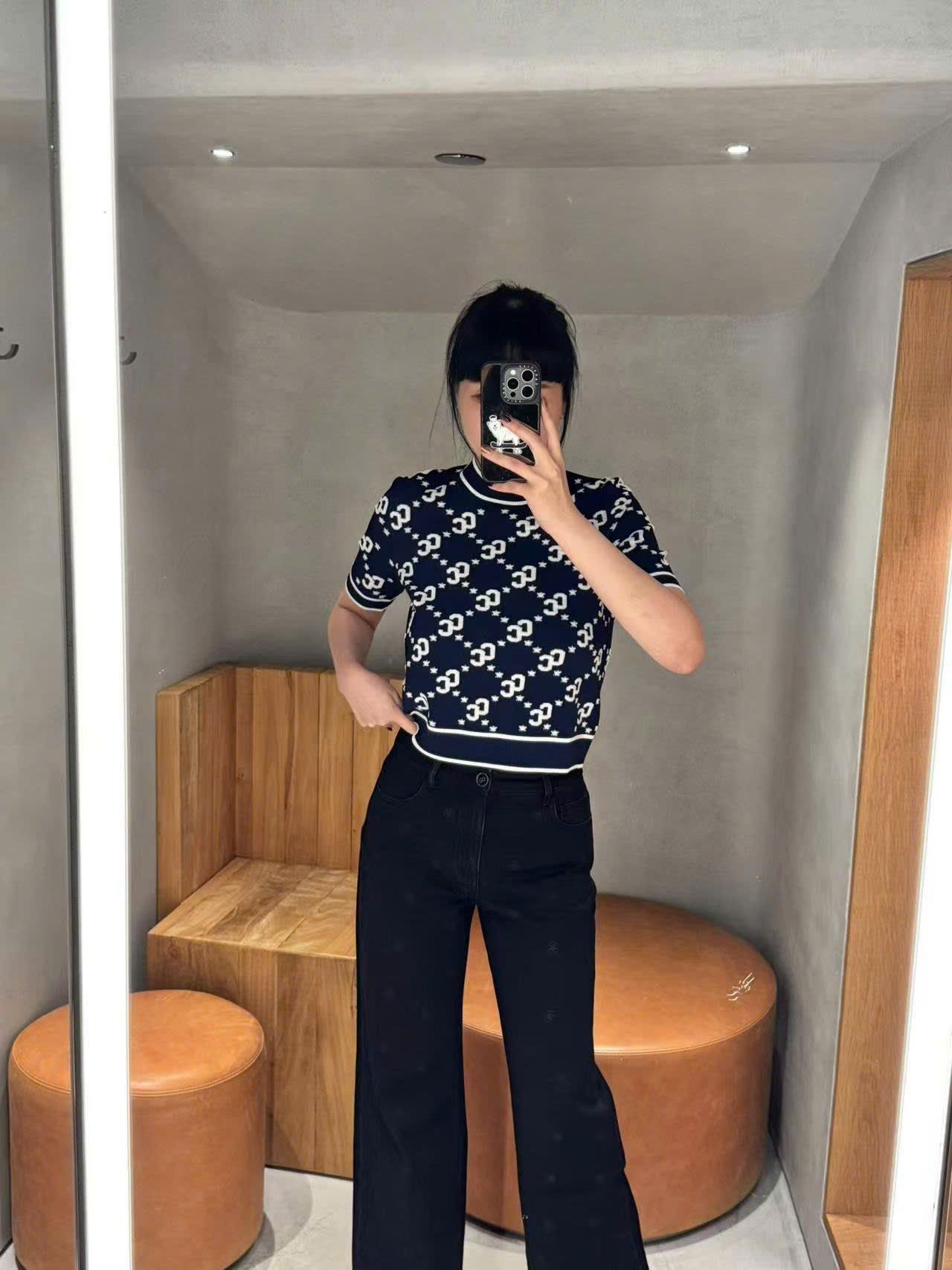  Quần jean đen hoa trà 