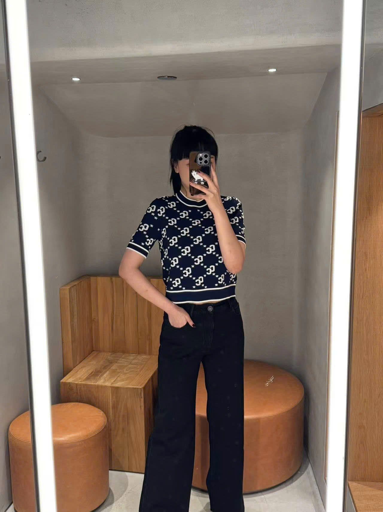  Quần jean đen hoa trà 