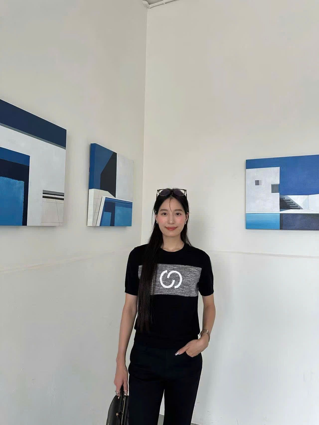  Quần jean đen ôm ống hơi vẩy 