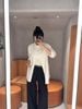  Áo sơ mi trắng dáng dài- gấu đen nhỏ 