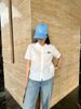  Áo sơ mi trắng logo đen , cổ sen , viền ren 