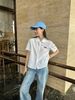  Áo sơ mi trắng logo đen , cổ sen , viền ren 