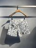  Bộ áo khoác và quần sooc jean trắng - họa tiết gấu set 
