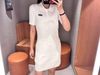  Váy polo trắng - Logo chữ nhật 
