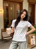  Áo phông trắng logo nhỏ ngực trái 