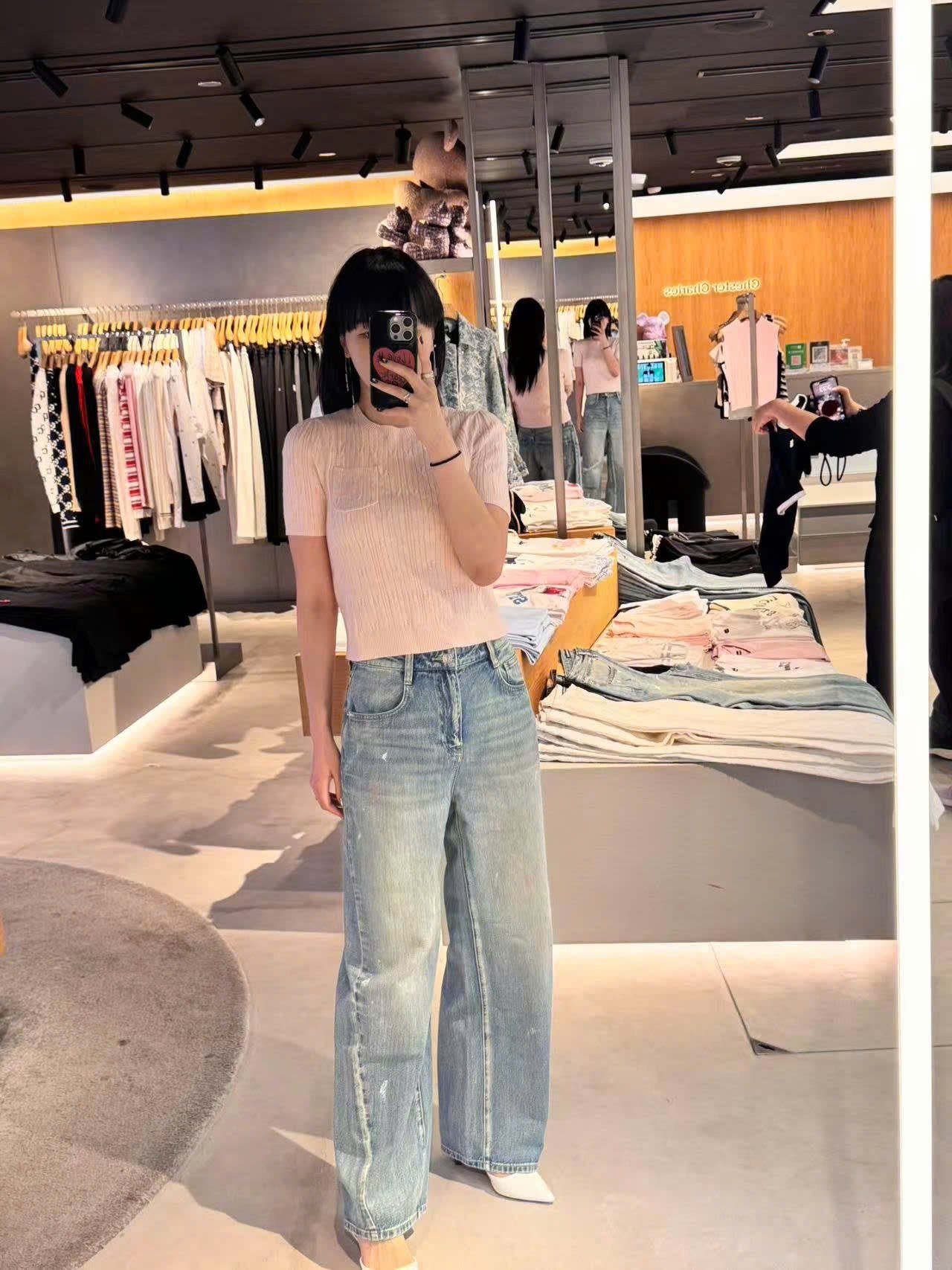  3.Áo hồng baby, vân sọc túi gấu 1 bên 