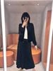  Chân váy nhung đen dài, logo đá nhỏ 