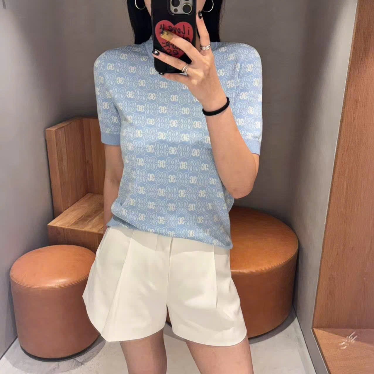  2.Áo xanh biển , full logo bo gấu 