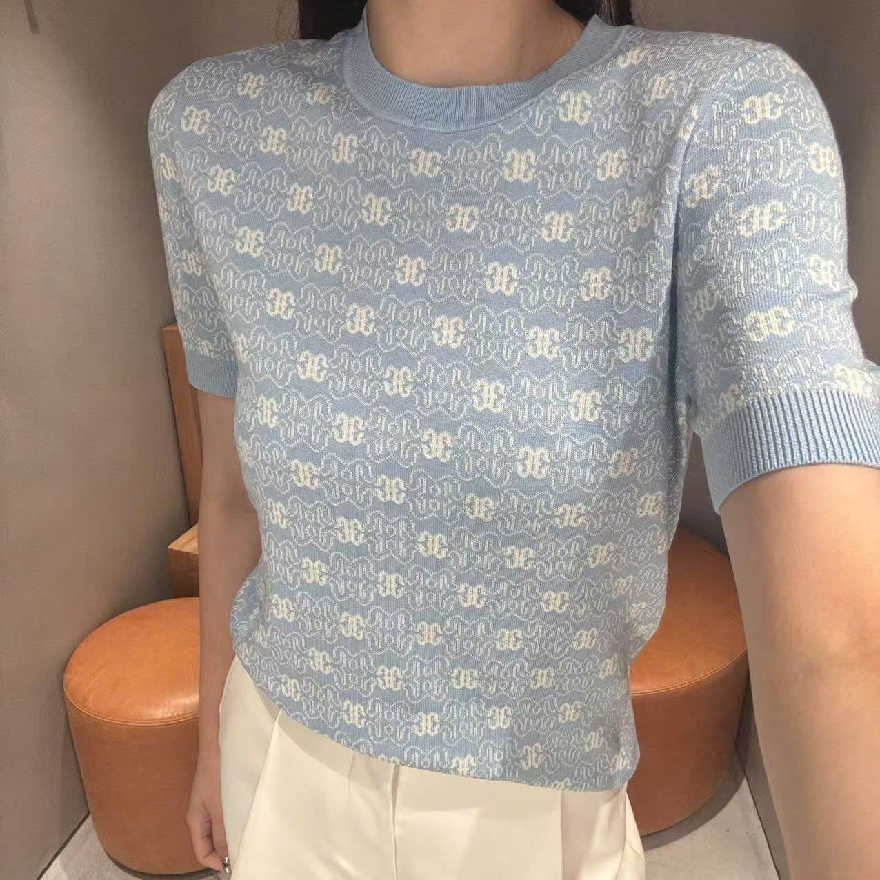  2.Áo xanh biển , full logo bo gấu 