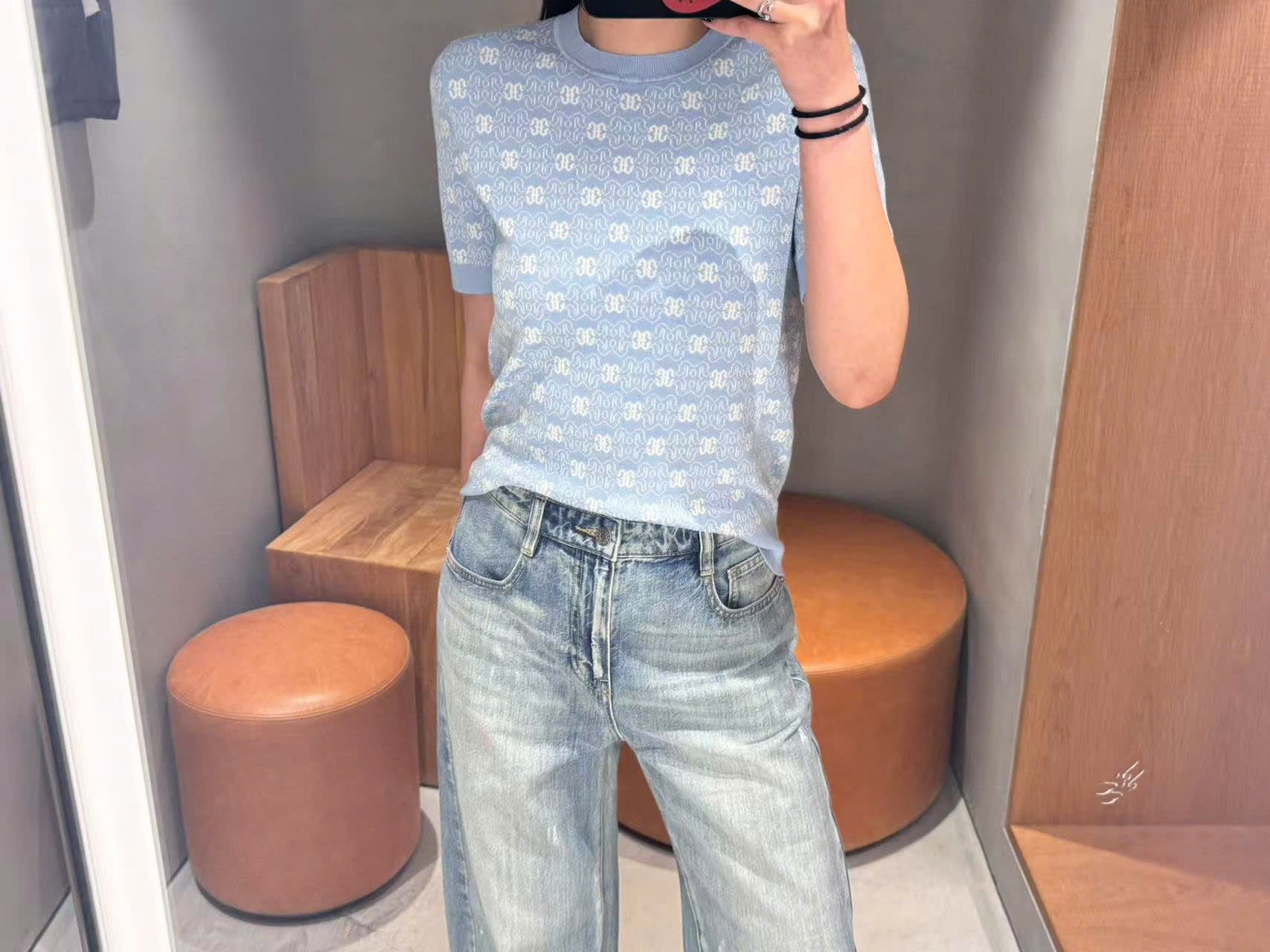  2.Áo xanh biển , full logo bo gấu 