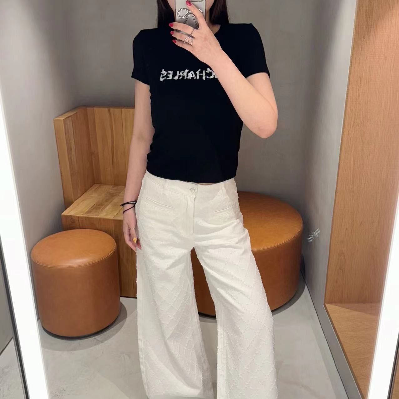  Áo len tăm đen - logo gắn lá 