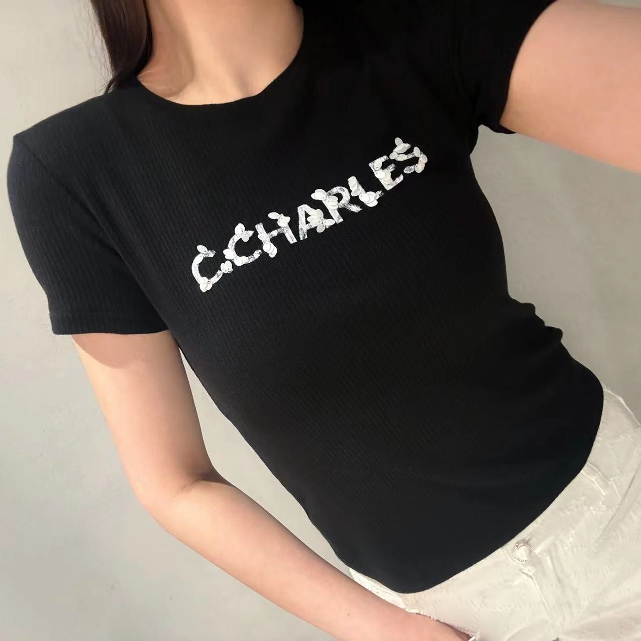  Áo len tăm đen - logo gắn lá 