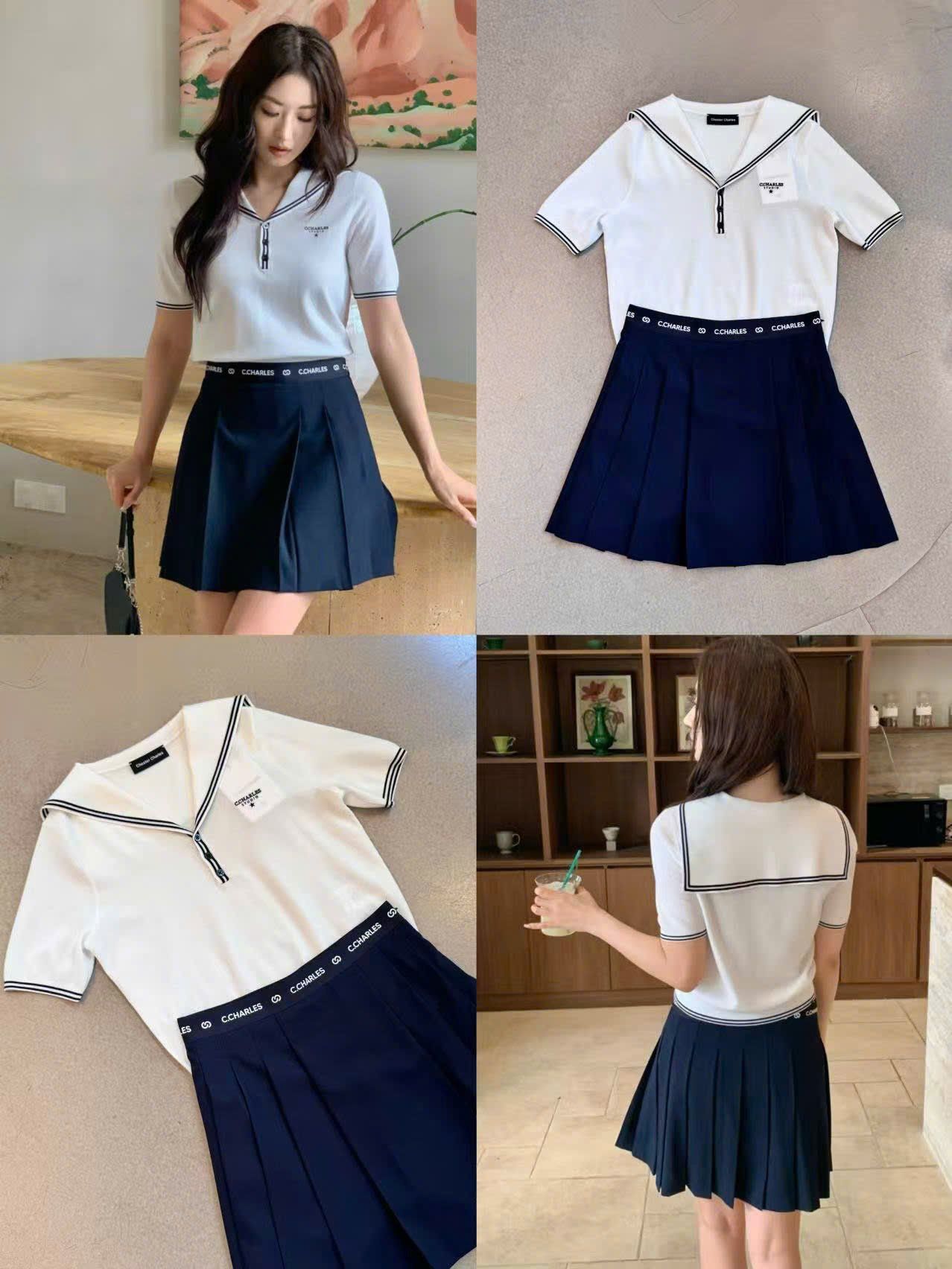  2.Chân váy đen ngắn xếp ly cạp chữ 0636 