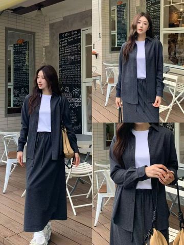  2.Áo Sơ mi xanh đậm - logo lồng 1 bên 