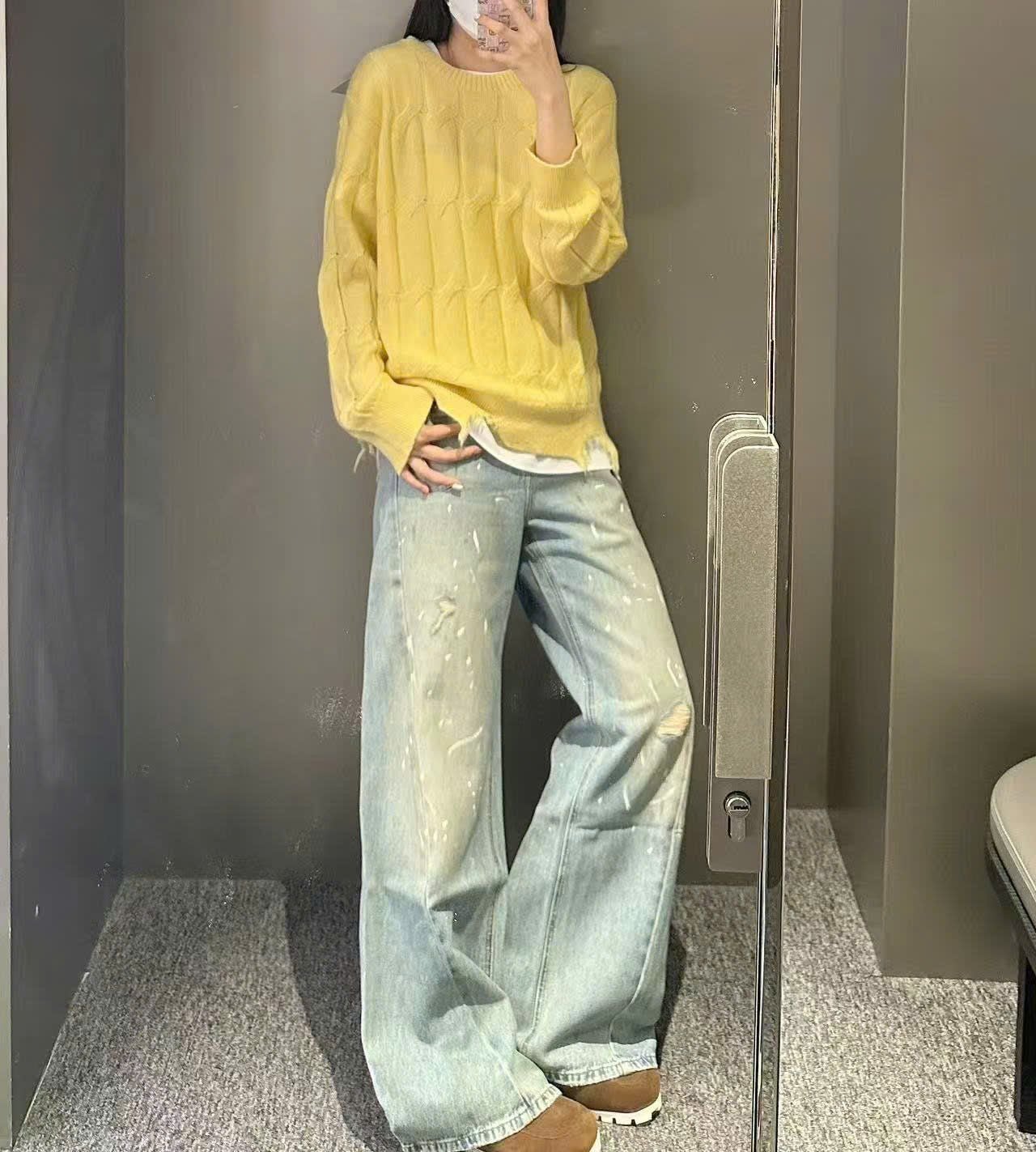  Áo len thừng vàng dài tay , rách gấu 