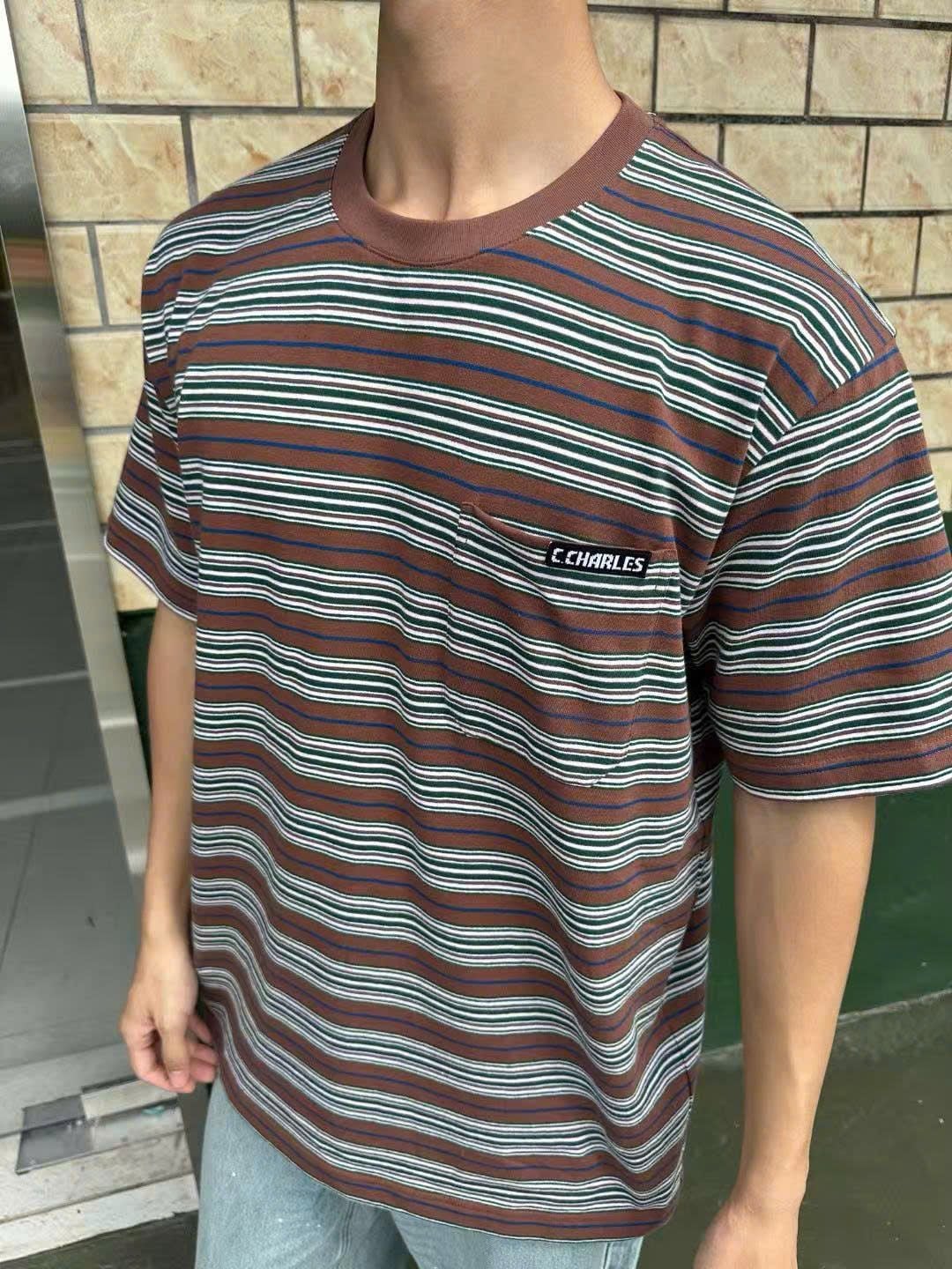  Áo phông nâu kẻ xanh Nam CC, túi 1 bên 