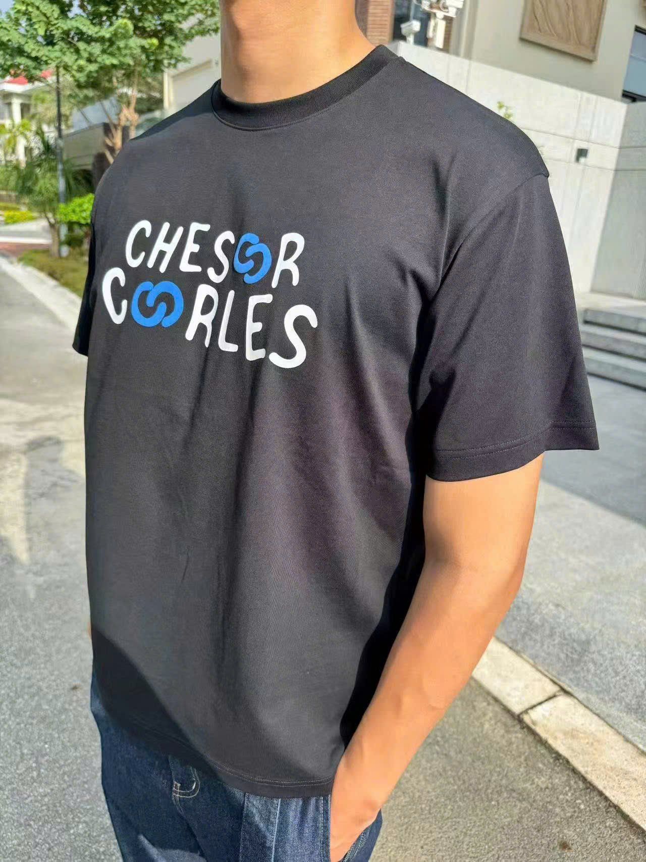  Áo phông đen Nam CC, chữ trắng lồng logo xanh 