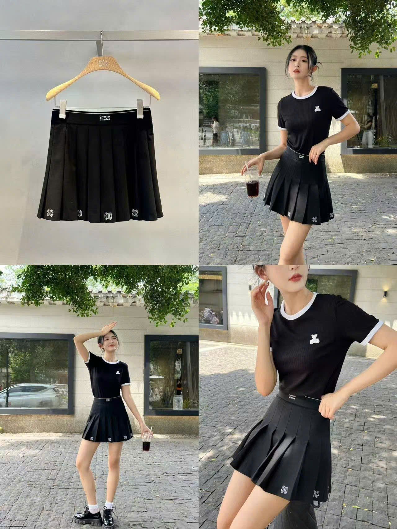  Chân váy ngắn đen, logo ở gấu 