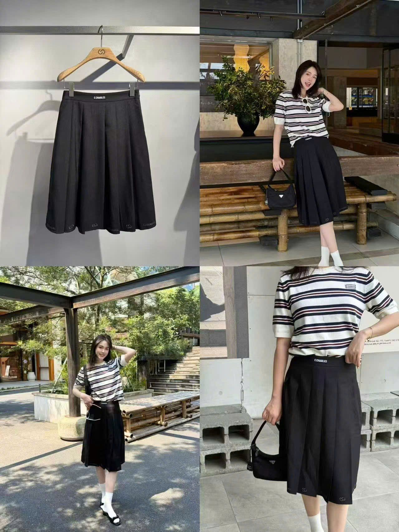  Chân váy dài xếp ly đen, cạp logo chữ trắng 