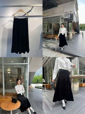  3.Chân váy nhung đen dài, logo đá nhỏ 