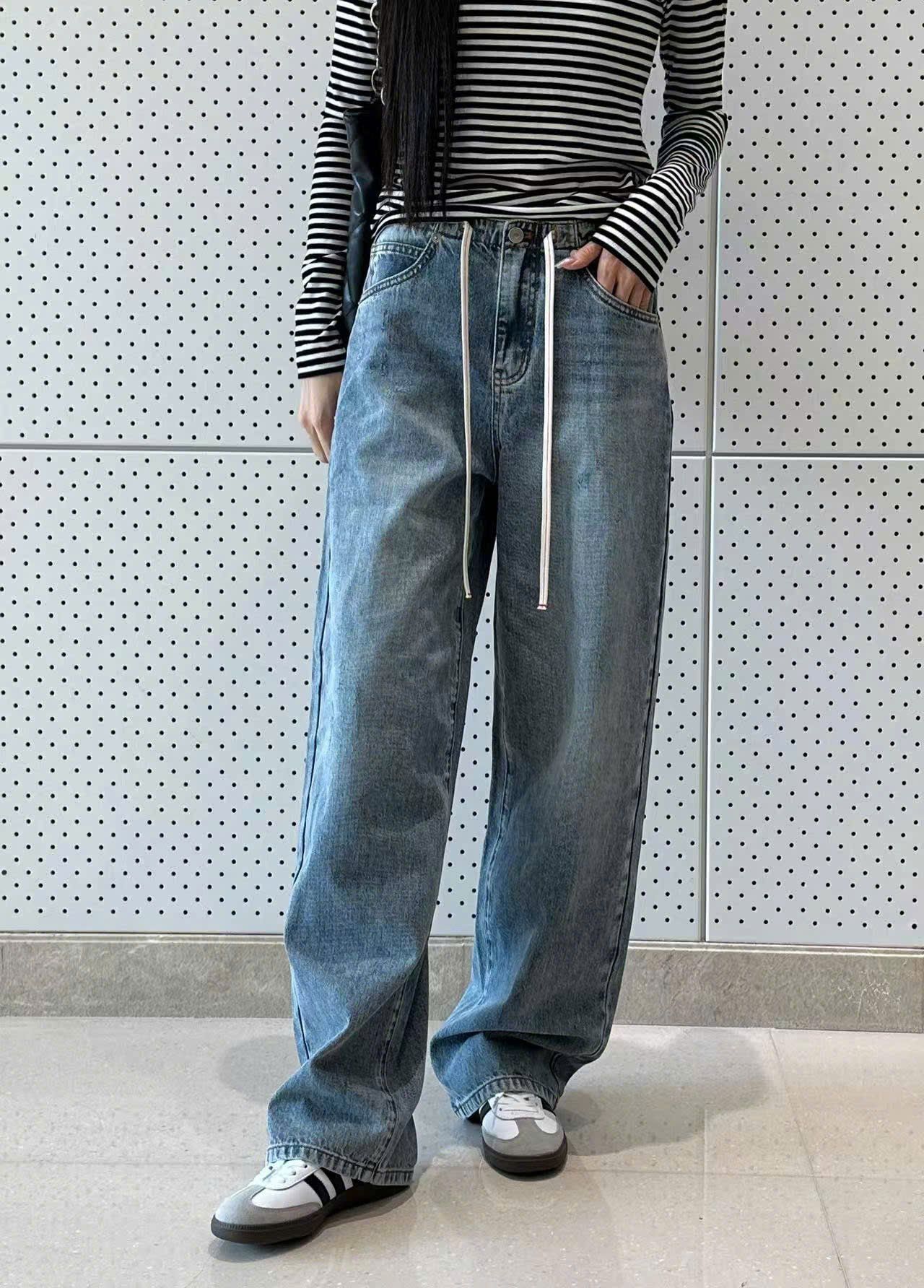  Quần Jean xanh , dây rút trắng 