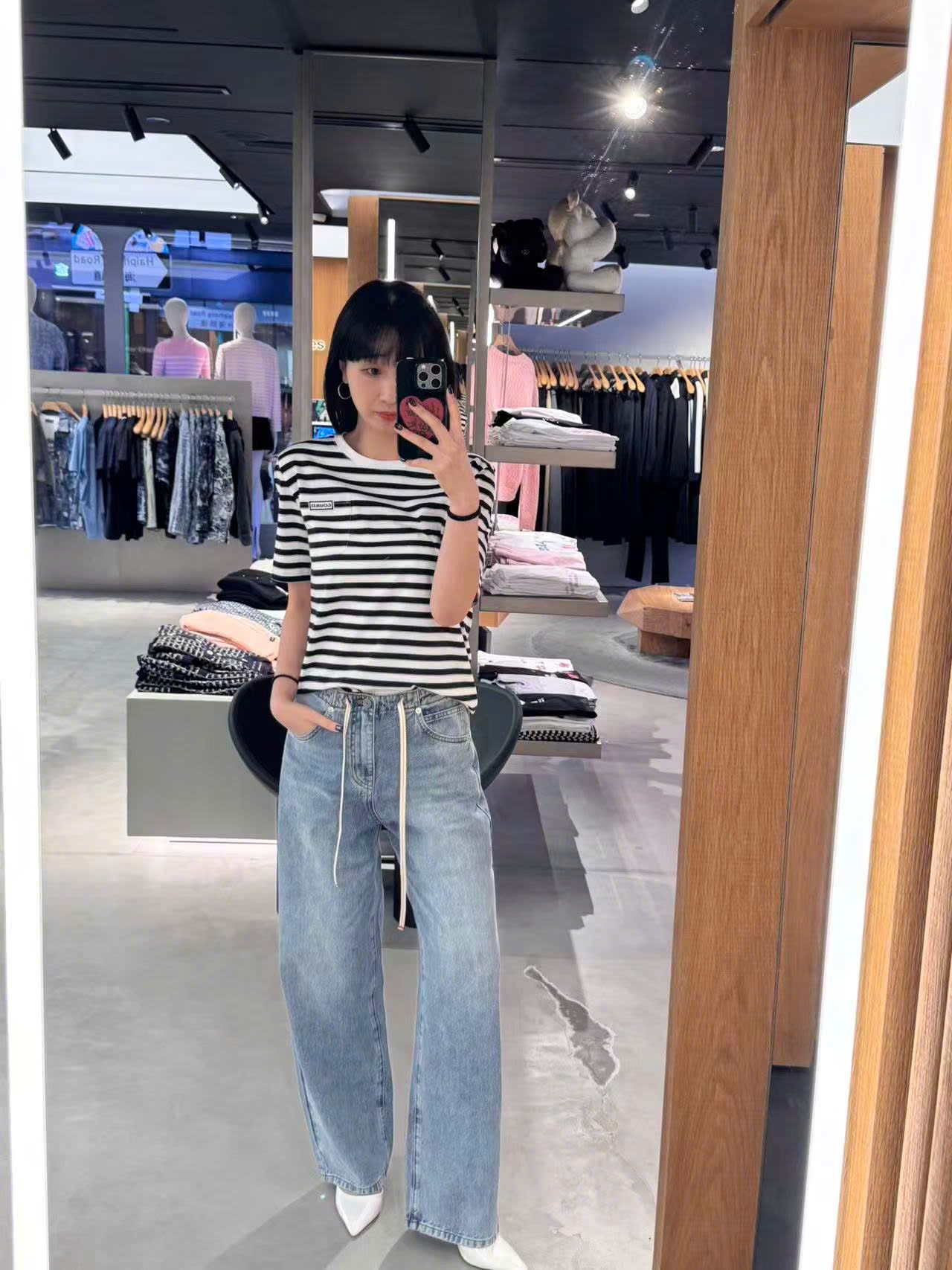  Quần Jean xanh , dây rút trắng 