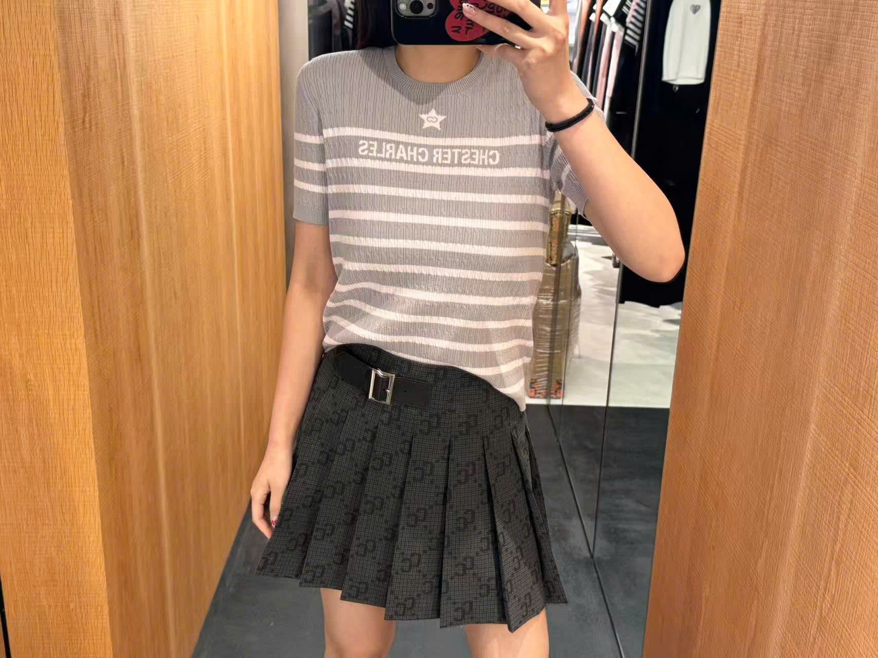  Chân váy ngắn kèm belt họa tiết thoi CC 