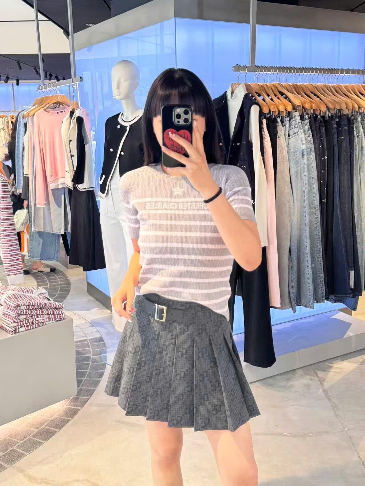  Chân váy ngắn kèm belt họa tiết thoi CC 