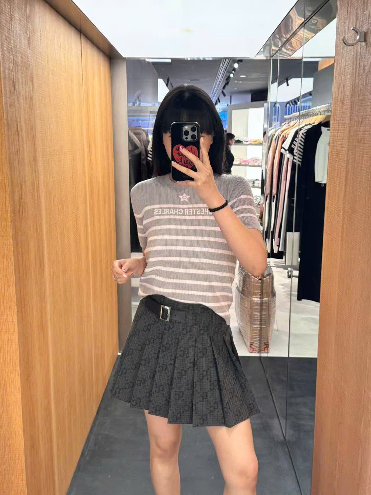  Chân váy ngắn kèm belt họa tiết thoi CC 