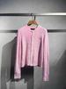  Áo CDG hồng dài tay gấu nhỏ 1 bên 