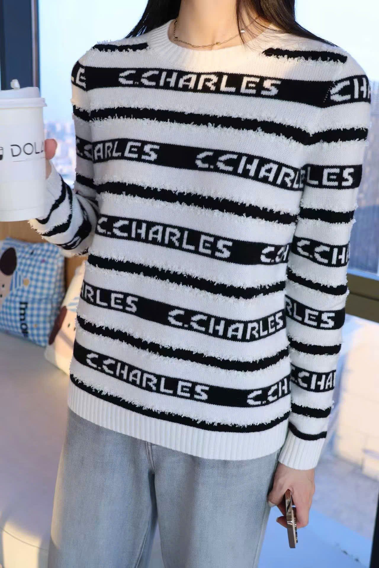  Áo trắng dài tay kẻ đen chữ trắng 