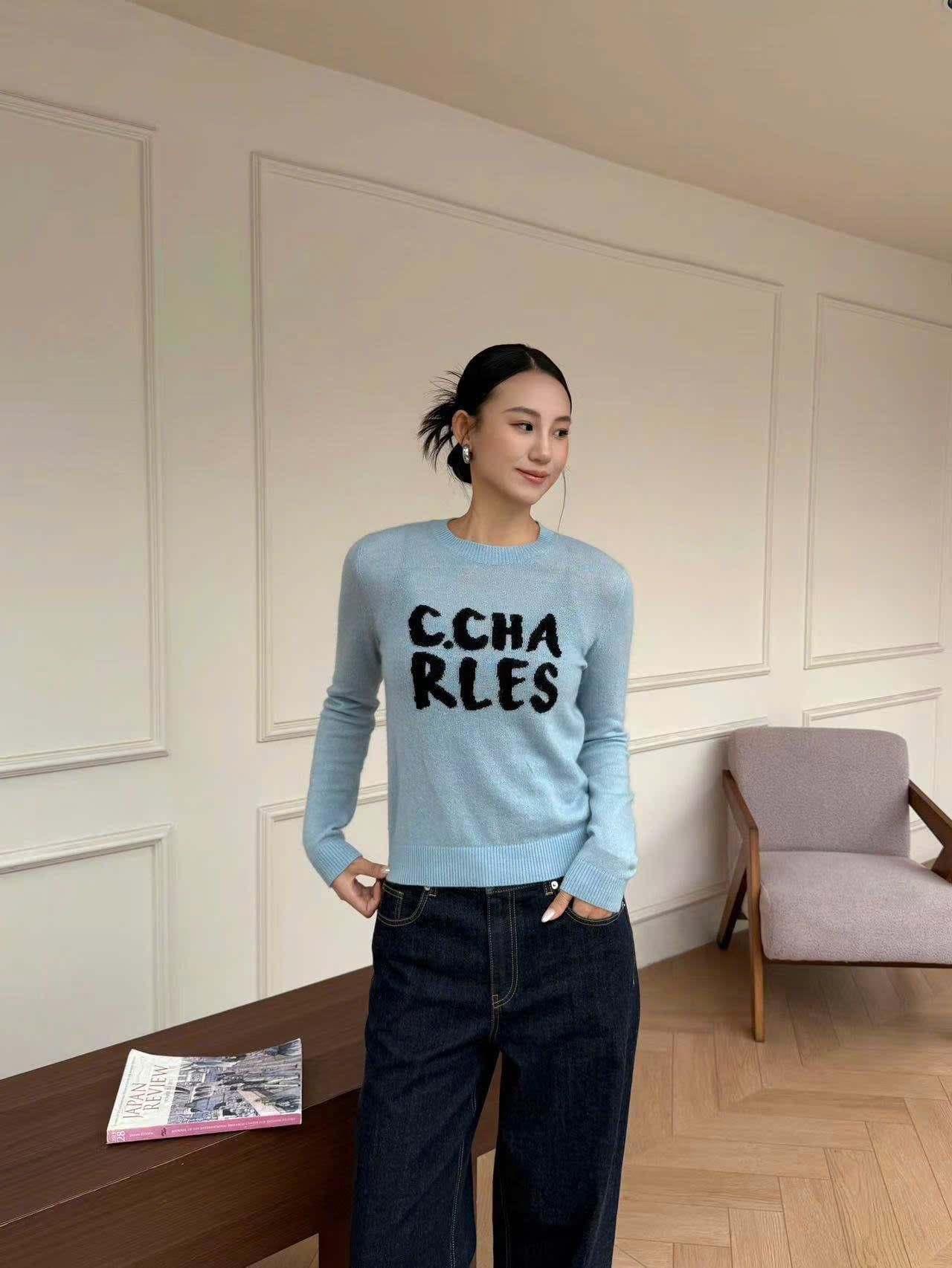  Áo len xanh ngọc chữ đen ngực 