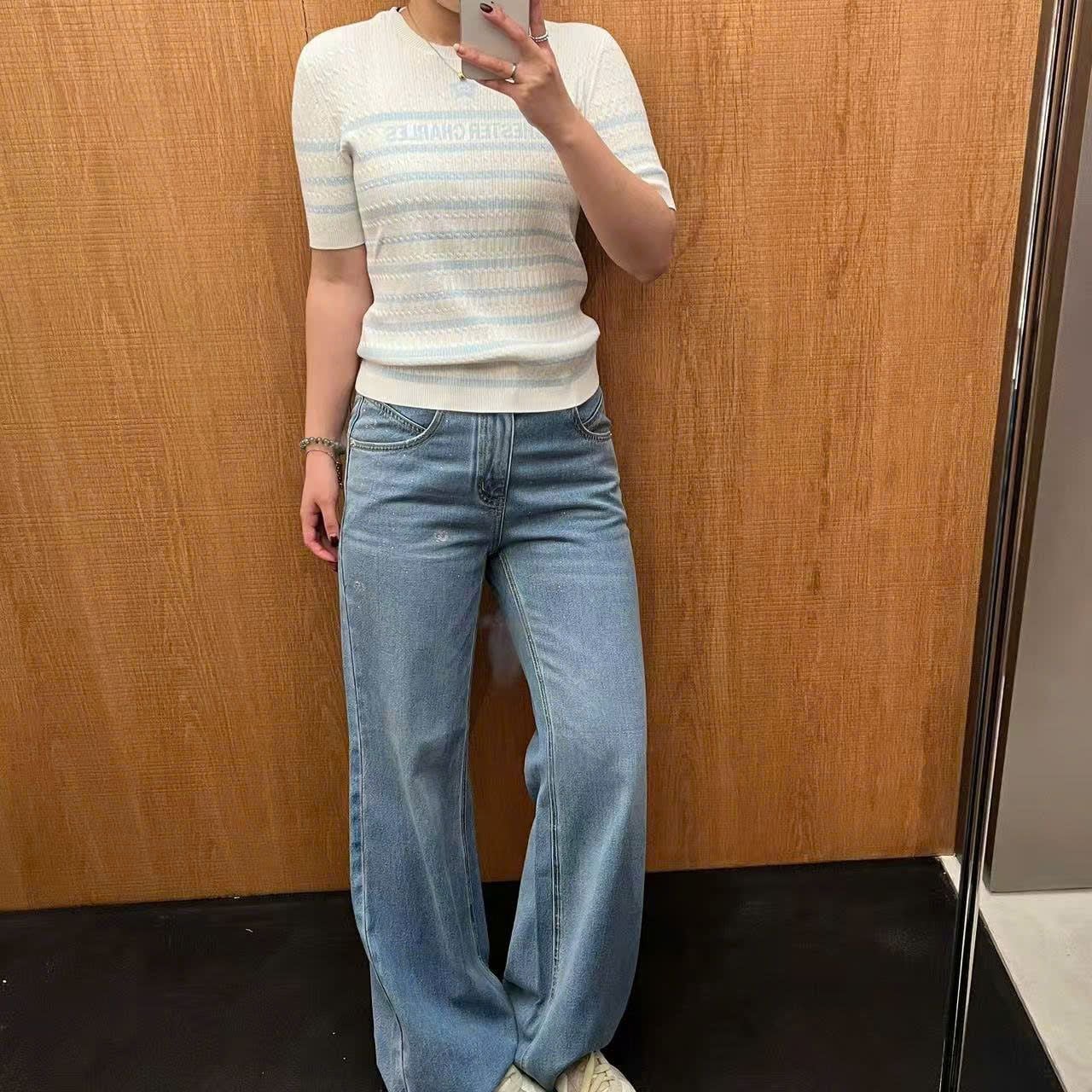  Áo trắng kẻ xanh ngôi sao giữa ngực 