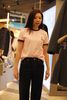  Áo phông hồng , viền đỏ gấu chữ 1 bên ngực 