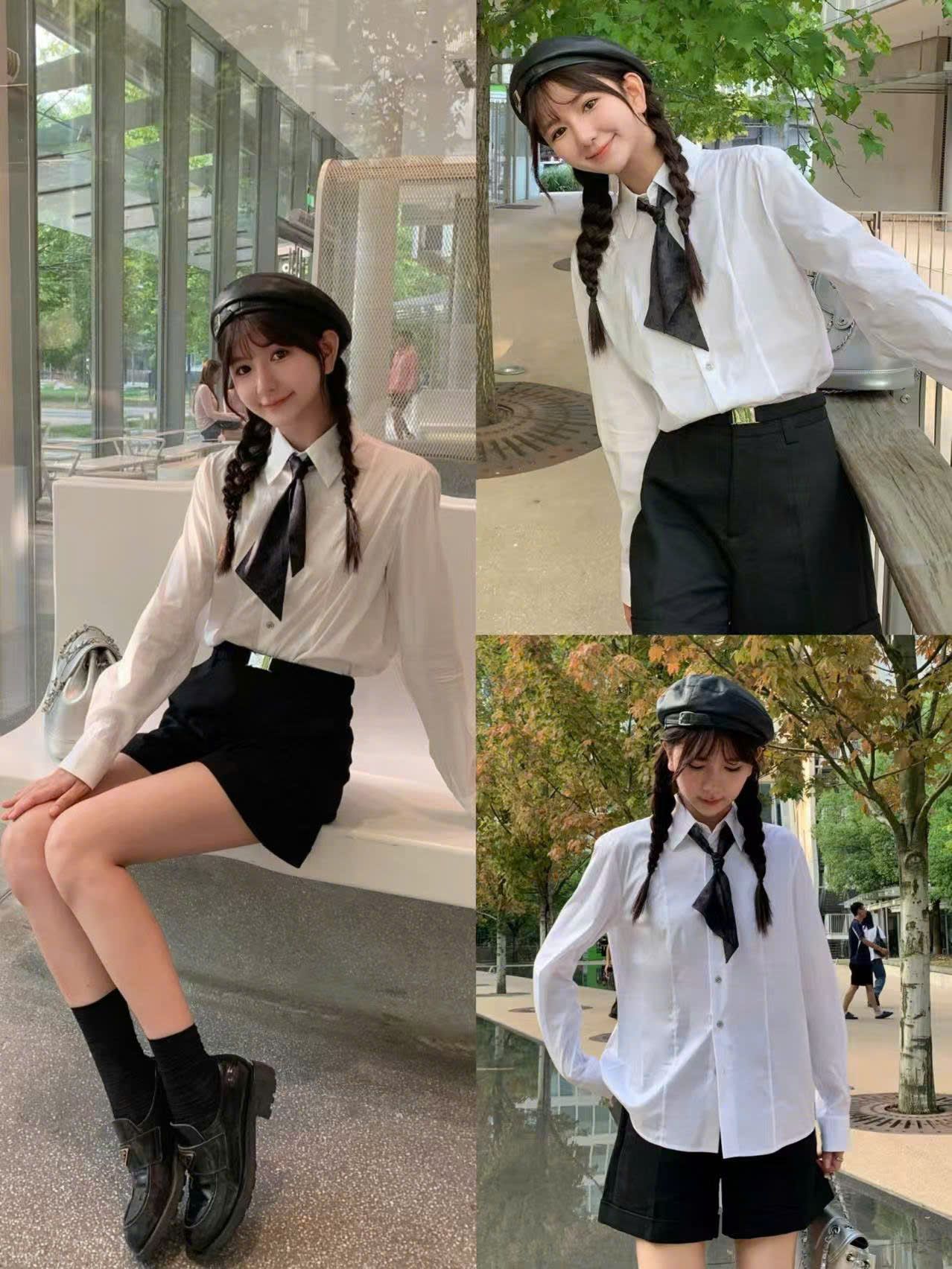  Sơ mi trắng - cà vạt đen vát chéo 