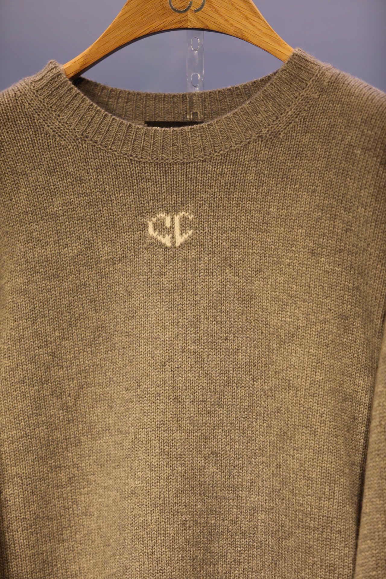  Áo len xám cánh dơi 