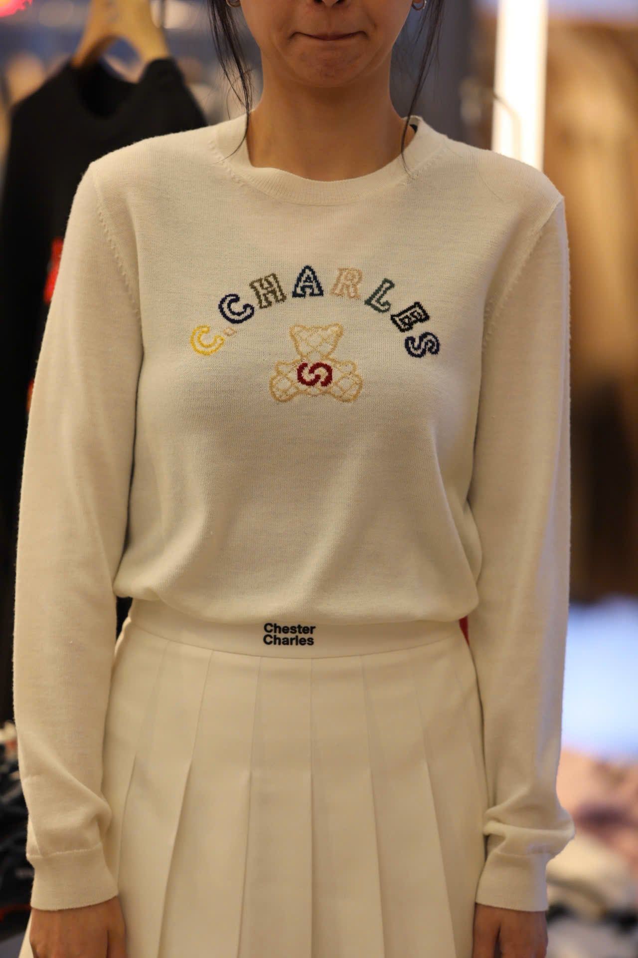  Chân váy ngắn trắng cạp chữ đen 