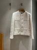  1.Áo tweed trắng viền đính ngọc 