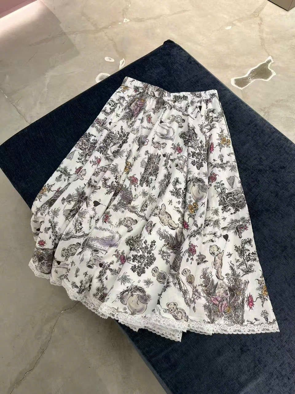  1.Chân váy trắng dài họa tiết phong cảnh 