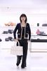  Áo CDG cổ V, màu xanh viền vàng, logo huy hiệu 