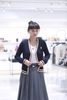  Áo CDG cổ V, màu xanh viền vàng, logo huy hiệu 