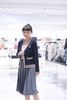  Áo CDG cổ V, màu xanh viền vàng, logo huy hiệu 