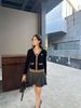  Áo CDG cổ V, màu xanh viền vàng, logo huy hiệu 