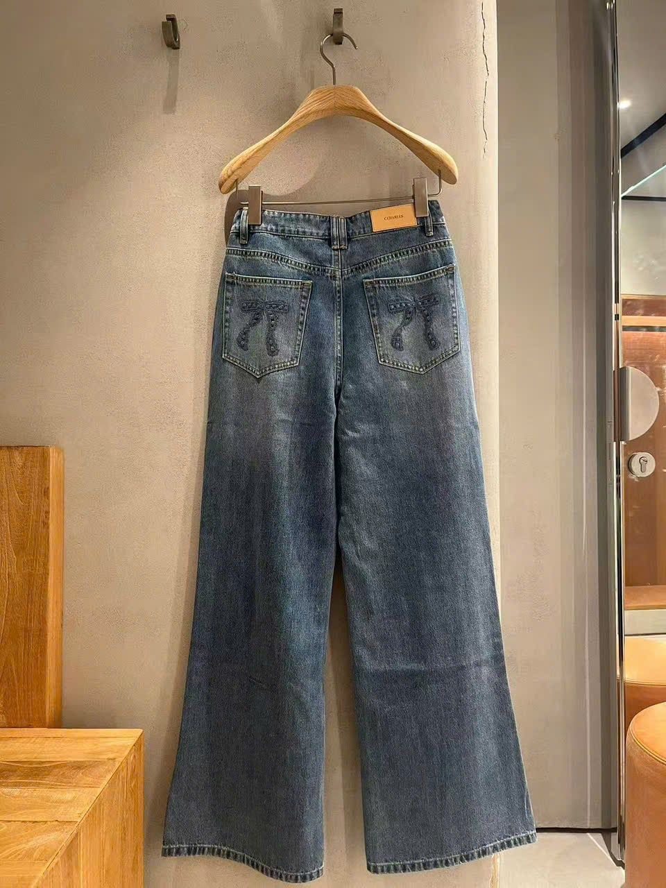  Quần jean xanh túi sau có nơ 