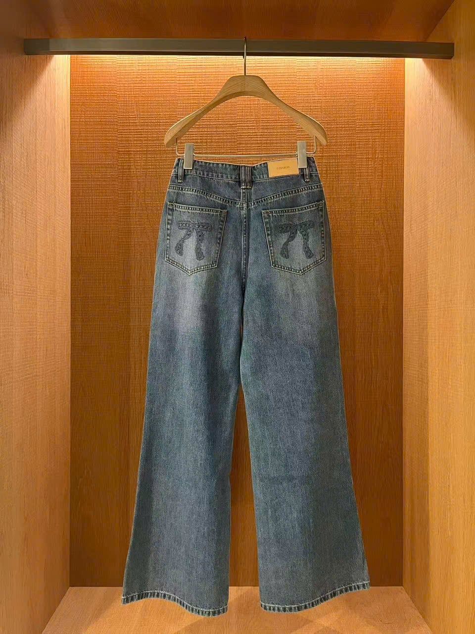  Quần jean xanh túi sau có nơ 