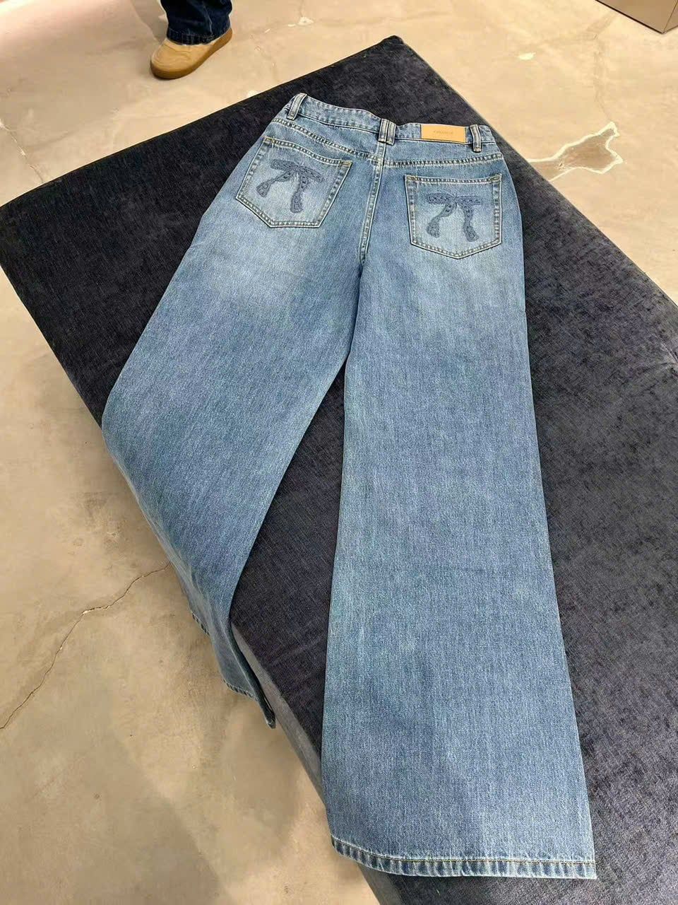  Quần jean xanh túi sau có nơ 